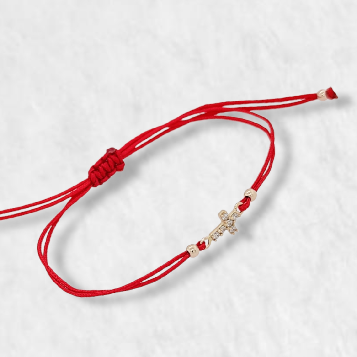 PhotoRoom-20221227_122209-e1672162113986 Brazalete (5.5 x 8 mm) Hilo Chino Rojo c/ Cruz Mini & Zircones - Oro Amarillo 14Kts - Image 1