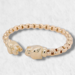 Pulsera Abierta Tejido Santos c/ Terminales Pantera - Oro Amarillo 14Kts