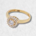 Anillo Compromiso Zircon Central c/ Halo de Zircones - Oro Amarillo 18Kts