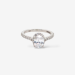 Anillo Compromiso c/ Zircon Oval Central c/ Halo & Aro de Diamantes Naturales Pave (0.31 Ct) - Oro Blanco 14Kts