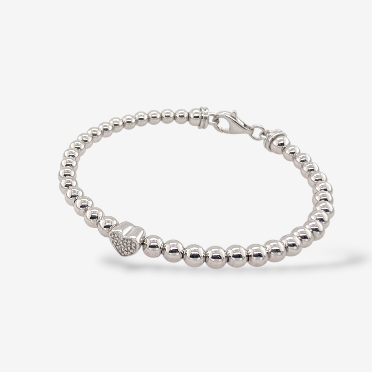 PXL_20260120_215723021-5.png Brazalete (#17) Esferas Lisas (4 mm) Corazon Central c/ Diamantes Pave (0.02 Ct) Cierre Lobster - Plata - Image 1