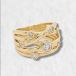 Anillo 5 Lineas Cruzadas c/ 7 Diamantes - Oro Amarillo 18Kts