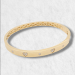 Pulsera Bangle c/ Corazones Diamantes Pave - Oro Amarillo 18Kts