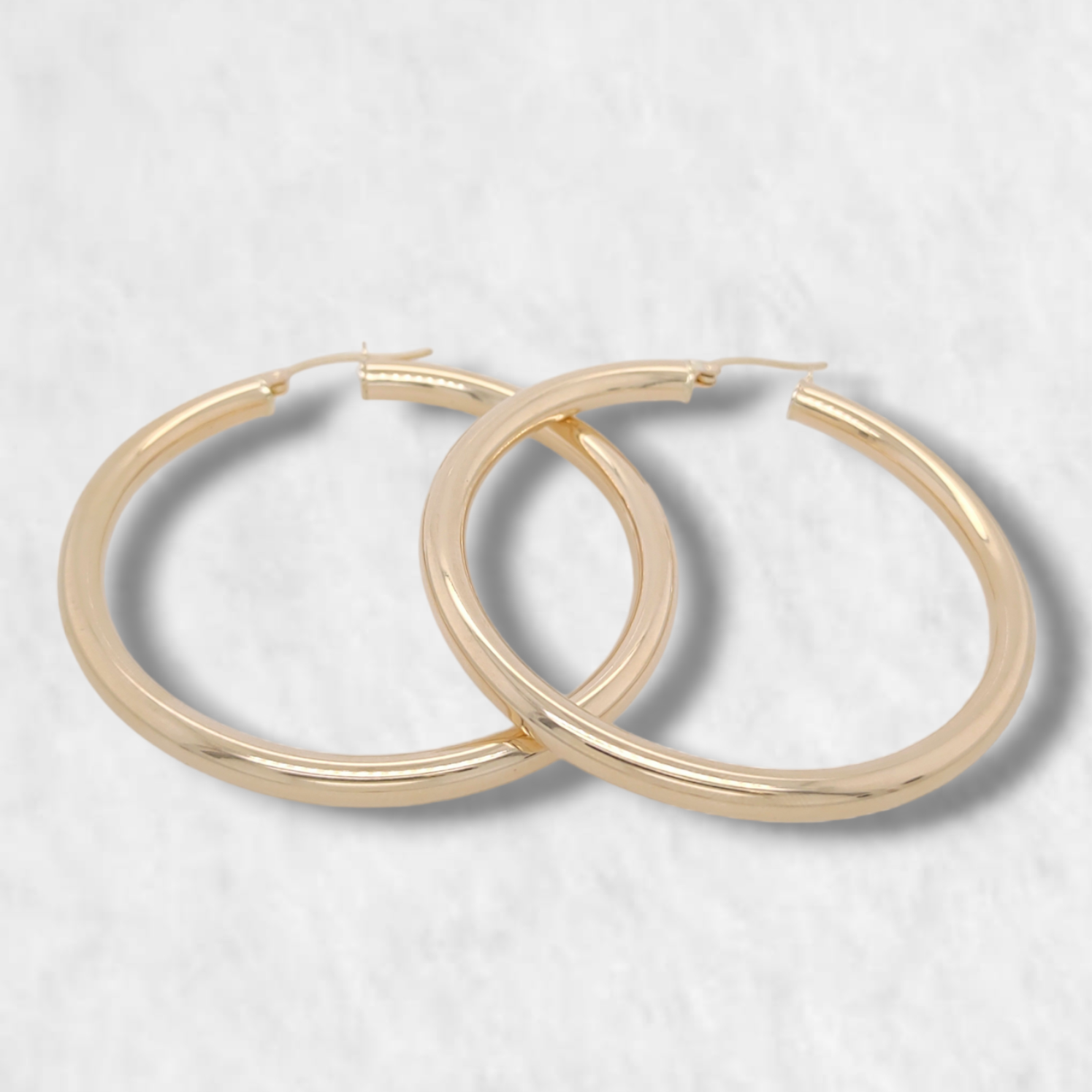 PhotoRoom-20230624_155734-e1687826041897.png Argollas (50 mm) Tubo Redondo (4 mm) - Oro Amarillo 18Kts - Image 1