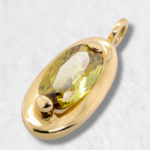 Dije (18 x 33 mm) Ovalo Cristal Peridoto - Oro Amarillo 18Kts