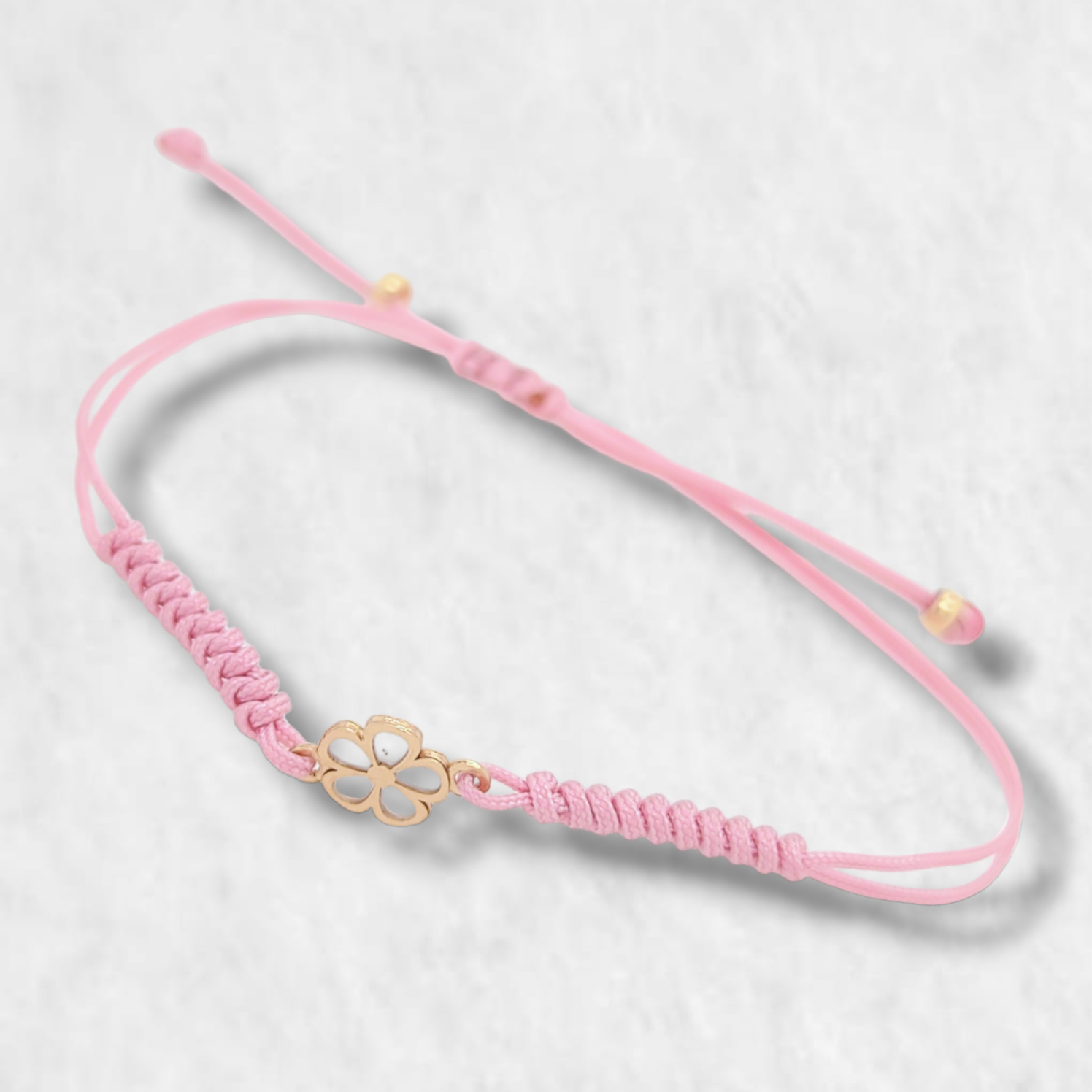 PhotoRoom-20231025_173920-e1698272405655.png Brazalete Ajustable Hilo Chino Rosa c/ Dije (7 x 6 mm) - Oro Amarillo 14Kts - Image 1