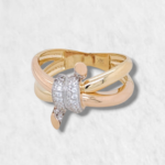 Anillo Lineas c/ Nudo de Zircones Pave - Oro Tres Tonos 14Kts