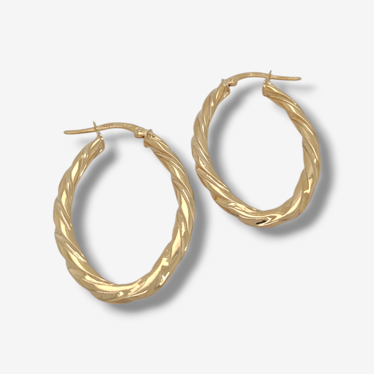 Photoroom-20241115_183119.png Argollas (23 x 35 mm) Melcocha Light Tubo Oval Aplanado - Oro Amarillo 14Kts - Image 1