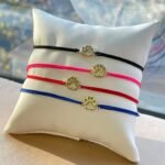 Brazalete (Ajustable) Huella de Perro c/ Hilo Chino - Oro Amarillo 14Kts